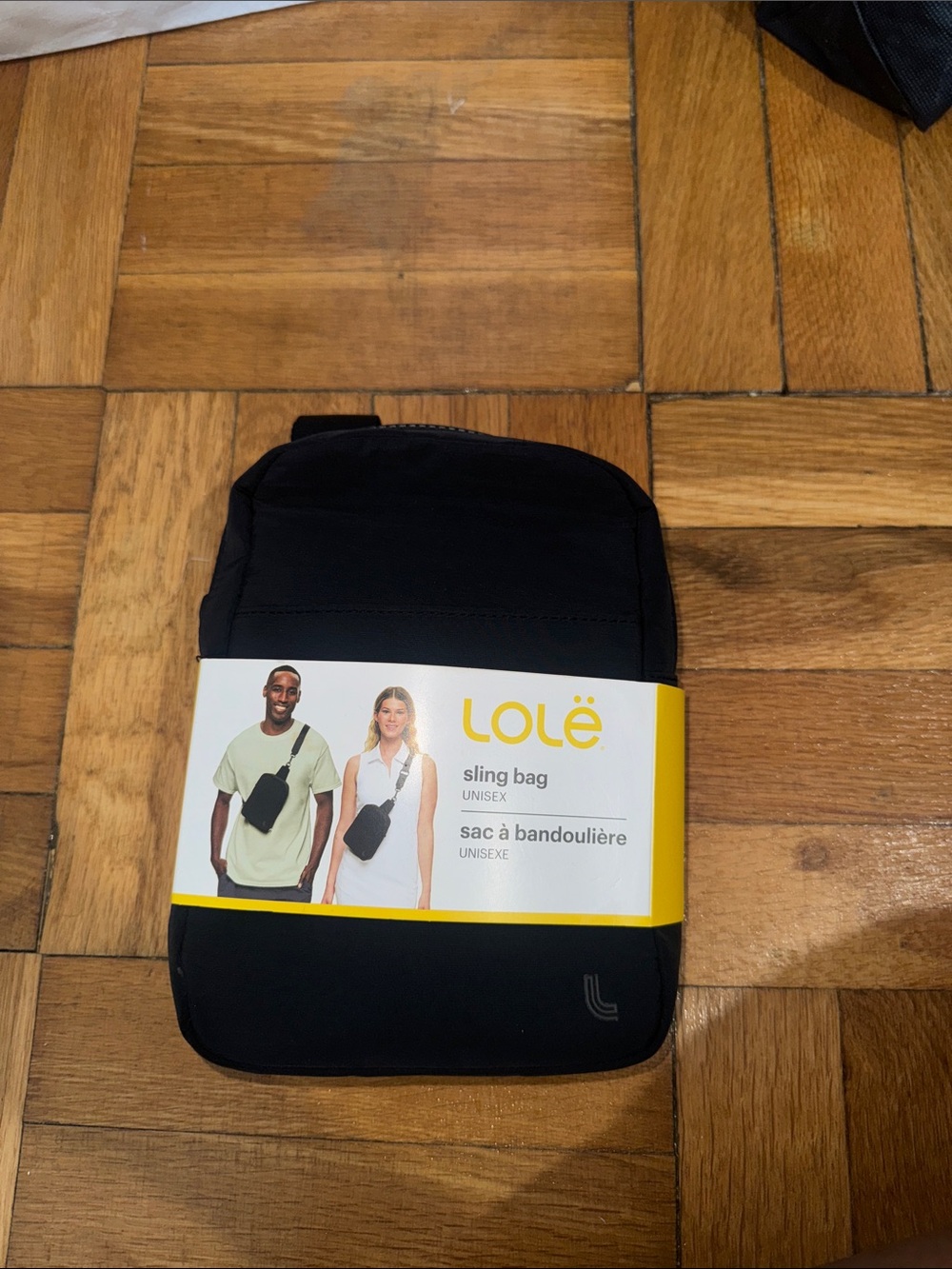 Lolé Black Unisex Sling Bag